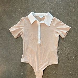 Reid’s bodysuit